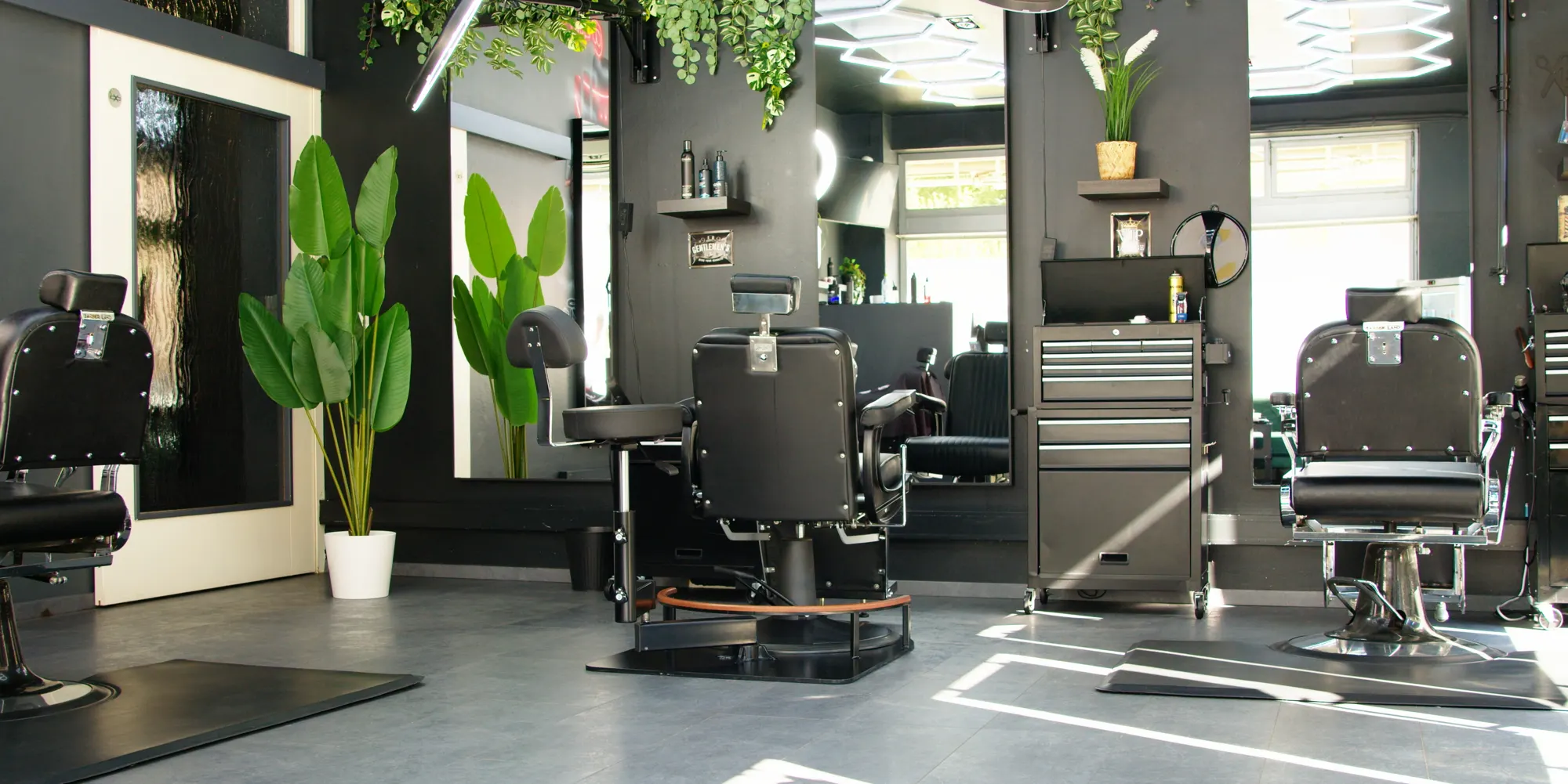 Barbershop with an OctoStool installed at a barber chair